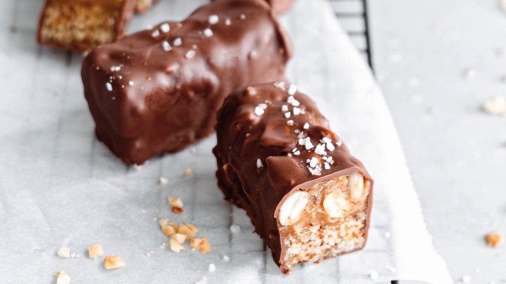 Homemade snickers bar on parchment paper