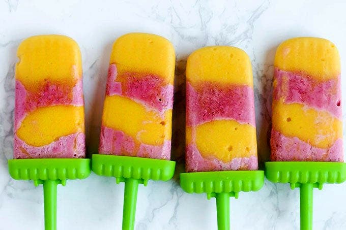 vegan popsicle with orange and pink layers
